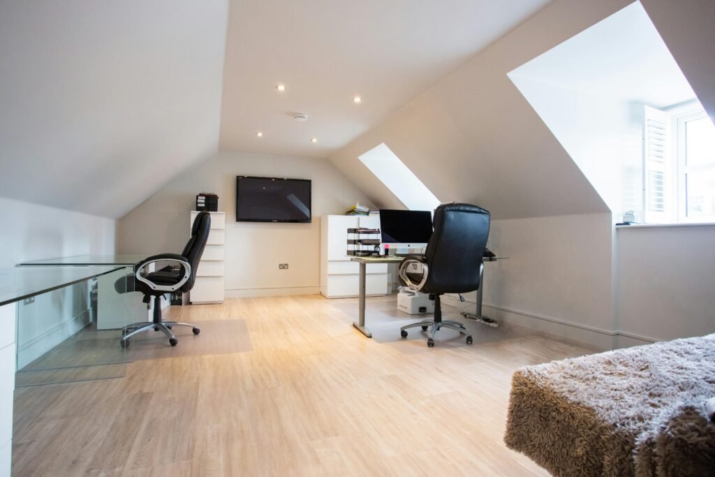 pexels-photo-16849902-16849902 Bright attic office with modern furniture and stylish decor in Colchester, UK.